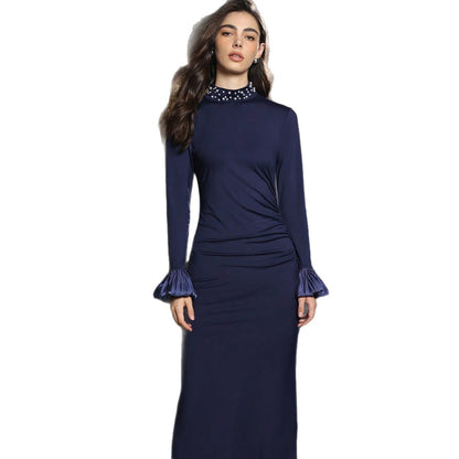 Slim-fit long-sleeved dress with pearl stand collar.