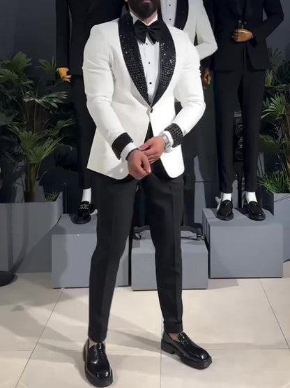 White tuxedo jacket with black sequin lapel.