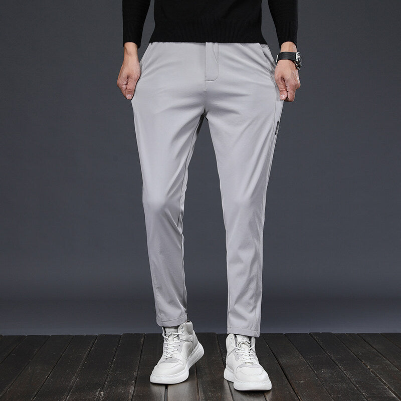 Men's loose-fitting trousers in solid colors, fashionable for men.