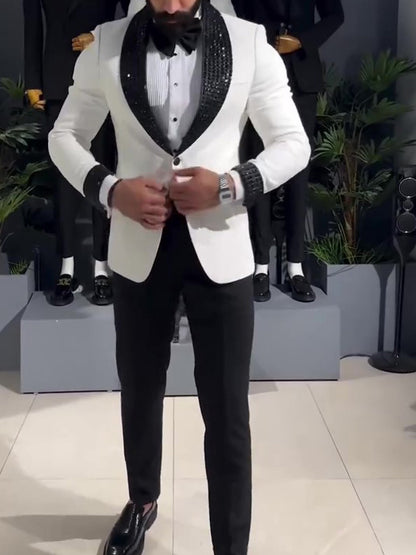 White tuxedo jacket with black sequin lapel.